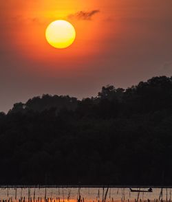 Scenic view of dramatic sky during sunset