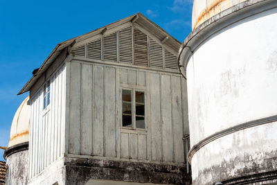 Low angle view of old building against sky