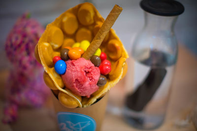 High angle view of multi colored candies on table