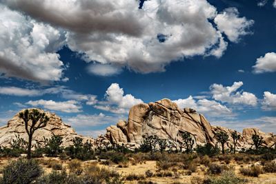 Scenic view of rocky mountains against sky