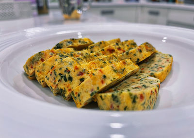 Close-up of served food in plate