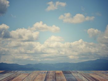 Scenic view of landscape against cloudy sky