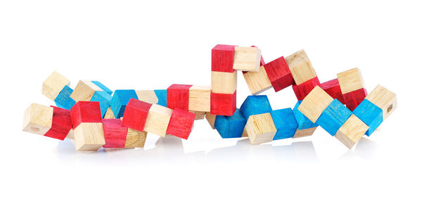 Close-up of multi colored pencils against white background