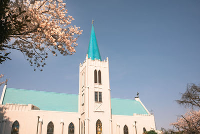 Low angle view of church against sky