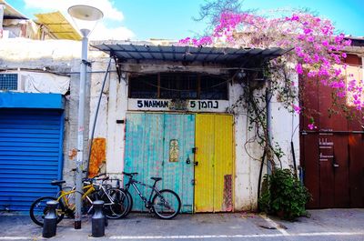 Bicycles on sidewalk by building