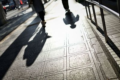 Low section of man on road