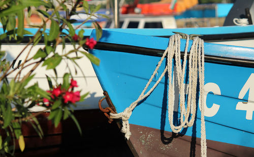 Close-up of rope tied to fishing boat