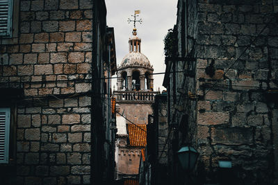 View of old building against wall