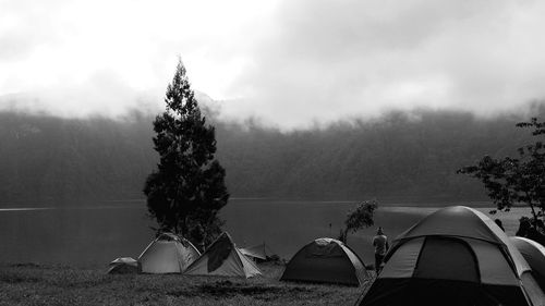 Scenic view of mountains against cloudy sky