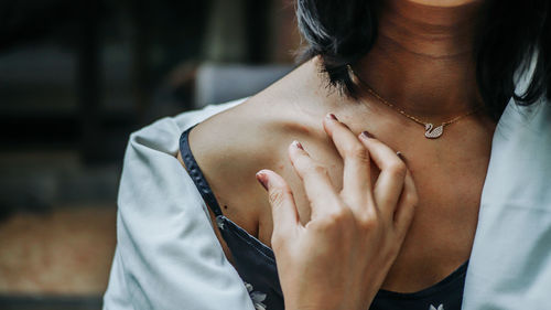 Rear view of woman with hands
