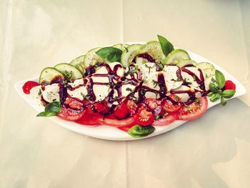 High angle view of fruit salad in plate on table