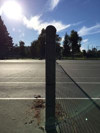 View of basketball hoop on countryside landscape