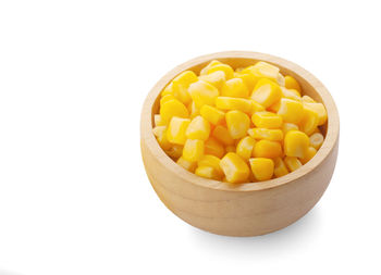 High angle view of eggs in bowl against white background