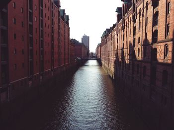 View of buildings in city against sky