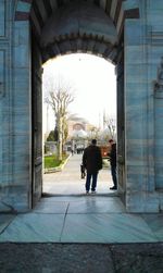 Men walking in city