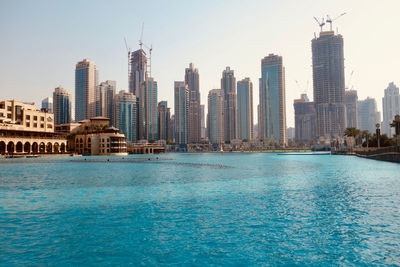 View of buildings in city at waterfront