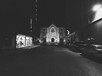 Illuminated walkway at night