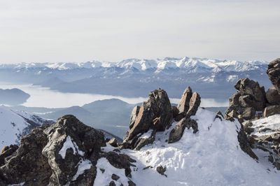 Snow covered mountains against sky