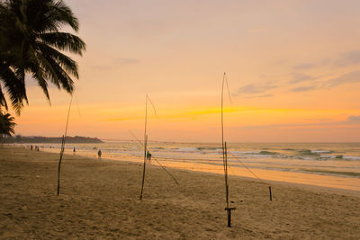 Scenic view of beach during sunset