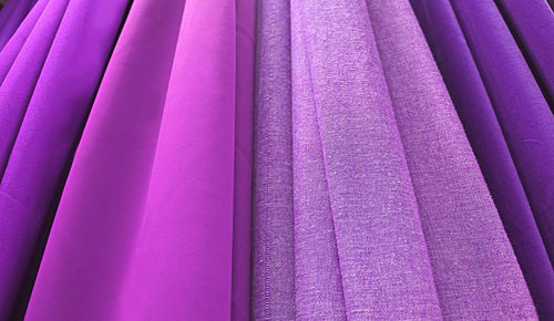 Fabrics in gradient purple and magenta color tone