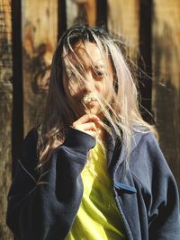 Portrait of young woman outdoors