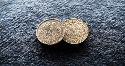 Close-up of one deutsche mark coins on table