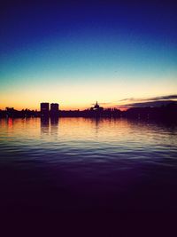 Scenic view of calm sea at sunset