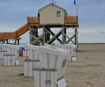 Beach chairs on a sandy beach on the north sea in sankt peter-ording