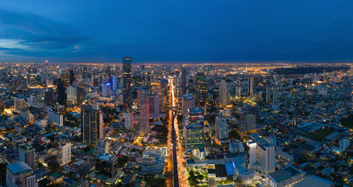 High angle view of illuminated buildings in city