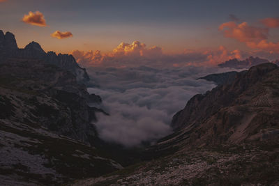 Scenic view of mountains against sky during sunset