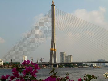 View of bridge against cloudy sky