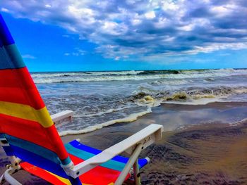 Scenic view of sea against cloudy sky