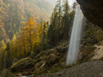 Pericnik waterfall in autumn at triglav national park in slovenia with fall colors