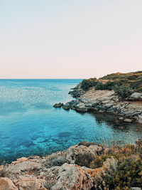 Scenic view of sea against clear sky