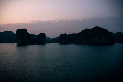 Scenic view of sea against sky at sunset