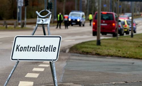 Road sign on street in city