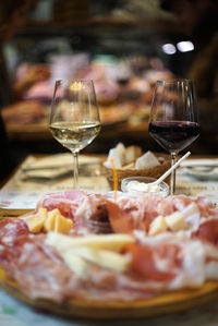 Close-up of wineglass on table