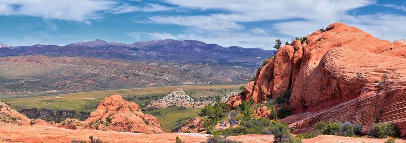 Panoramic view of rocky mountains against sky