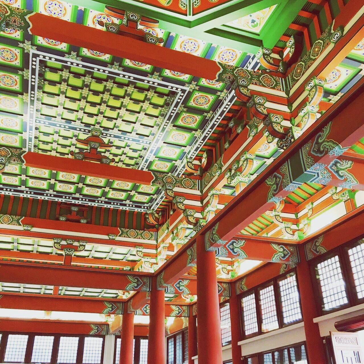 low angle view, ceiling, architecture, culture, architectural feature, ornate, place of worship, in a row, temple - building, multi colored, day, repetition, full frame, red, collection