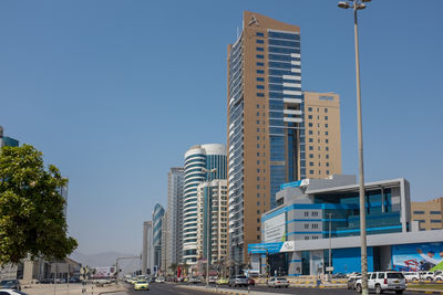 Low angle view of buildings against blue sky