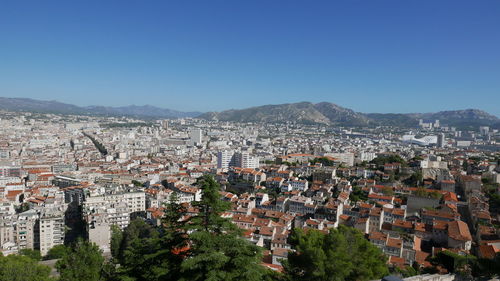 High angle shot of townscape against sky