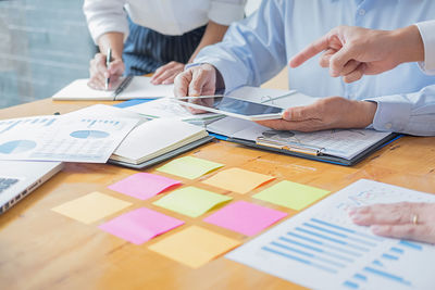 Group of people working on table
