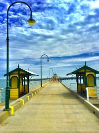 View of bridge over sea against sky in city