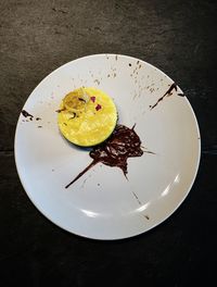 High angle view of lemon slice in plate on table