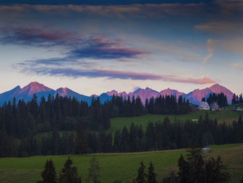 Scenic view of mountains against sky during sunset