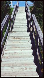 View of wooden pier on boardwalk