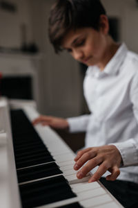 Boy playing piano