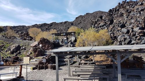 Panoramic view of trees and mountains against sky