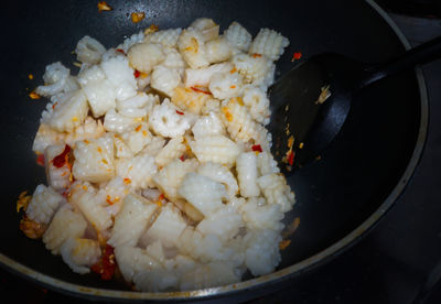 High angle view of meat in cooking pan