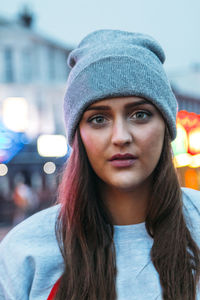 Portrait of young woman wearing knit hat